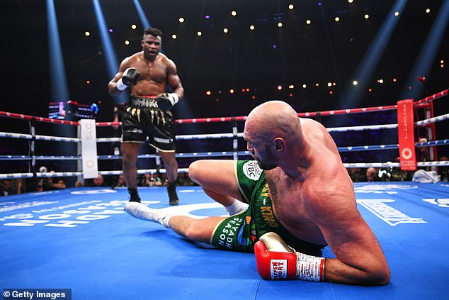 The MMA fighter (left) has also stepped into boxing, was contentiously beaten on points by Tyson Fury last October then viciously knocked out by Anthony Joshua