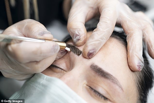 Brow tinting, the wildly popular beauty service shown above, is prohibited in New York State, and has been since 1994 according to the New York Department of State (stock image)