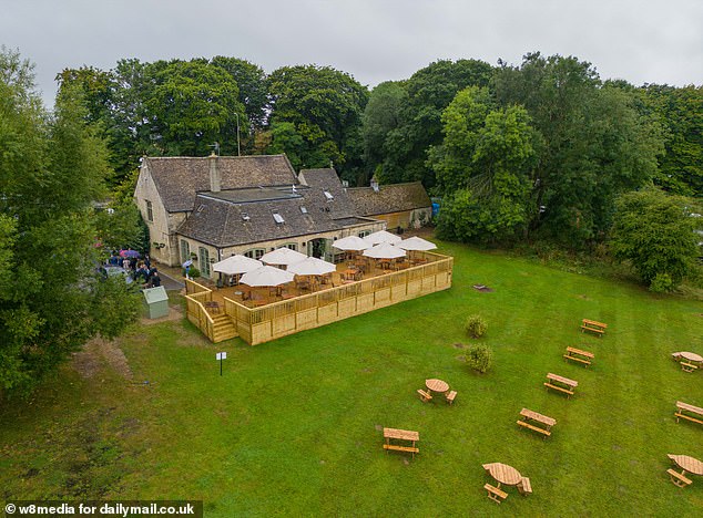 The pub features an outdoor terrace, for diners only and benches on the lawn