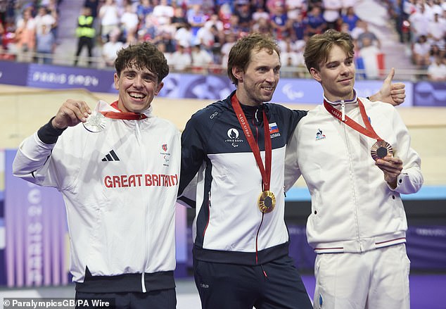 The gold medal went to Slovakia's Jozef Metelka (centre), while bronze belonged to Frenchman Gatien le Rousseau (right)