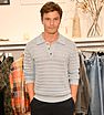 Model Oliver Cheshire attended the launch of British Menswear brand Wax London's new Covent Garden store.