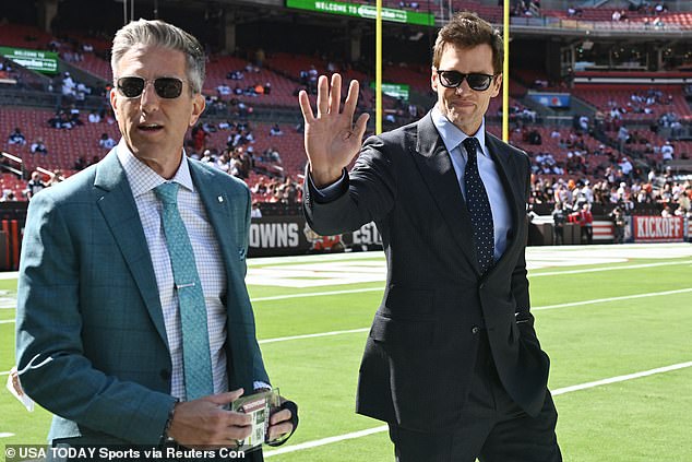 Brady, alongside commentary partner Kevin Burkhardt, on the field in Cleveland last Sunday