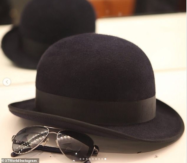 A heartbreaking snap showed Tito's signature bowler hat and aviator shades