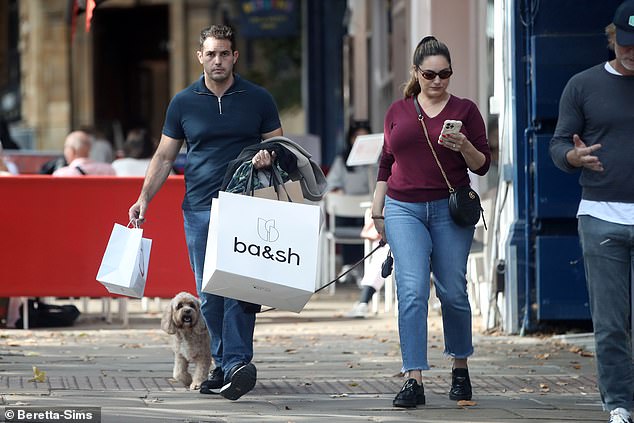 Paired with the designer bag, Kelly wore a maroon jumper, jeans and chunky loafers