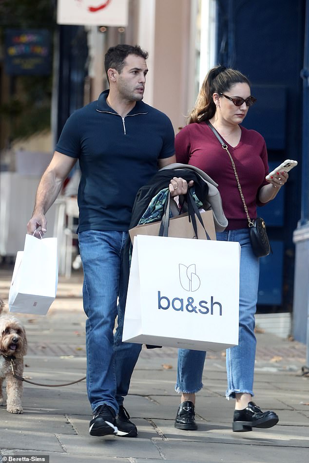 The couple had been shopping and carried some bags with them