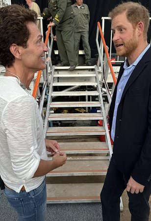 Awkward moment Richard Marx almost ignores Prince Harry at Kevin Costner's charity event -