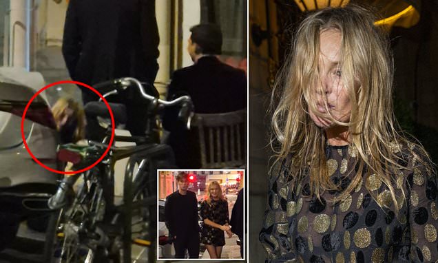 Kate Moss takes a dramatic tumble while enjoying a cigarette outside daughter Lila Moss'