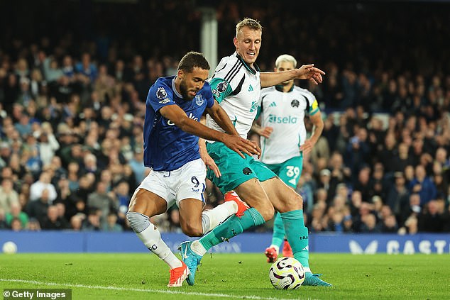 Dominic Calvert-Lewin (left) was denied a penalty after falling under pressure from Dan Burn