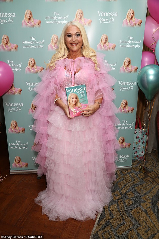 Vanessa wore a pastel pink dress with a tiered ruffled skirt and a plunging neckline. For some photos she threw on a matching bubblegum pink cape as she beamed for photographers