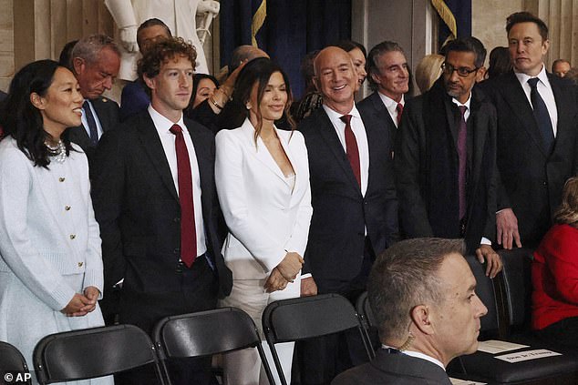 Sanchez wore a white lace bra on full display with a matching ivory pantsuit as she appeared beside her fiancee Jeff Bezos , 61, for the inauguration on Monday