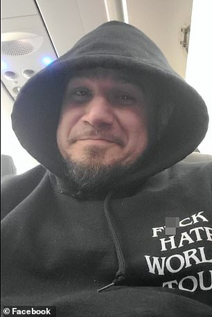 John Garcia Jr. was kicked off a Spirit flight for wearing a hoodie with the words: 'FVCK HATE WORLD TOUR' (pictured)