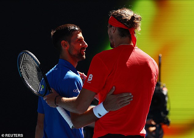 Djokovic embraces Alexander Zverev after he was forced to put an end to his Open campaign