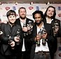 Winning team: Elbow received cheers and applause as they scooped awards for Best Contemporary Song and Best Song Musically and Lyrically