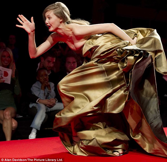 Catwalk moment: It is not the first time Lindsey has tripped on the runway - in May, she fell several times at Naomi Campbell's Fashion for Relief fundraiser in Cannes