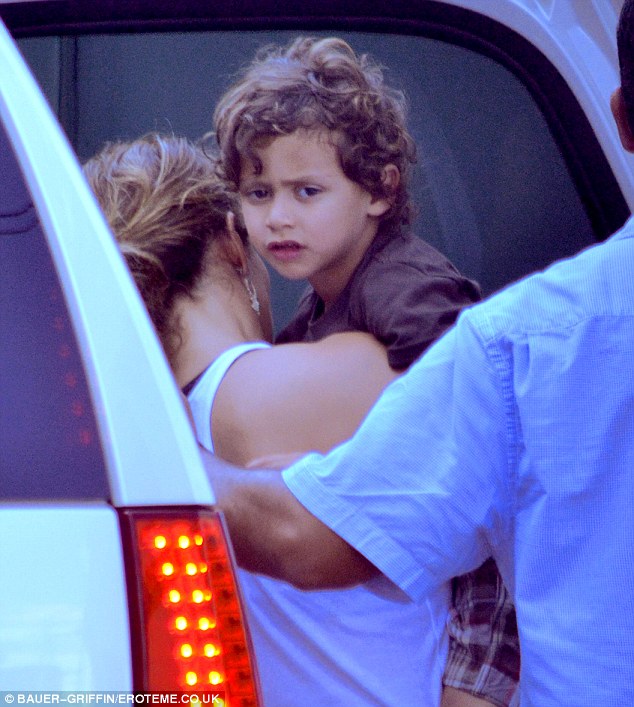 Mama time: Jennifer with twin son Max in between takes while filming a new music video