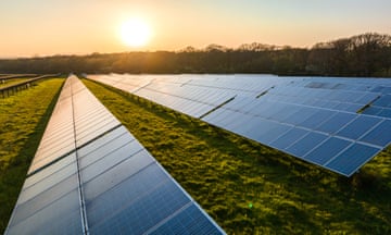 Panels of a solar power farm in the evening light