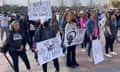 A group gathered on the street holding signs with pro-choice slogans