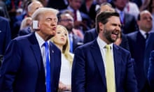 Donald Trump and JD Vance laughing, in blue suits