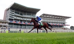 Ghaiyyath, ridden by jockey William Buick, on the way to winning the Juddmonte International Stakes at York.