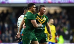 Latrell Mitchell (L) and Jack Wighton (R) in rugby gear on the field in 2021