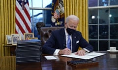 Joe Biden<br>FILE - In this Jan. 20, 2021, file photo, President Joe Biden signs his first executive order in the Oval Office of the White House in Washington. Biden laid out an ambitious agenda for his first 100 days in office, promising swift action on everything from climate change to immigration reform to the coronavirus pandemic. (AP Photo/Evan Vucci, File)