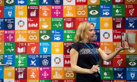 A delegate takes part in a video call at Cop26.