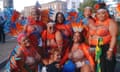 Group of women in colourful carnival outfits