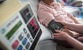 A man has bis blood pressure checked  by a nurse