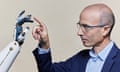 Yuval Noah Harari photographed touching fingers with a robot in a style similar to that of Michelangelo's the Creation of Adam