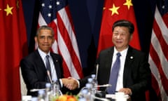 FILE PHOTO: U.S. President Barack Obama shakes hands with Chinese President Xi Jinping during their meeting at the start of the climate summit in Paris November 30, 2015. REUTERS/Kevin Lamarque/File Photo