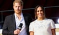 Harry and Meghan Markle appear onstage at the 2021 Global Citizen Live concert