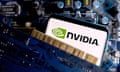 The Nvidia logo on a smartphone lying on a computer motherboard 