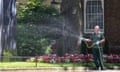 Downing Street gardeners watering the flowers using a water hose pipe. According to the Met Office, the hot weather is likely to continue which may result in a ban on water sprinkler and garden hose pipe. Featuring: Atmosphere, View Where: London, United Kingdom When: 26 Jun 2018 Credit: Dinendra Haria/WENN<br>STOCK PIC - PBAYAR Downing Street gardeners watering the flowers using a water hose pipe. According to the Met Office, the hot weather is likely to continue which may result in a ban on water sprinkler and garden hose pipe. Featuring: Atmosphere, View Where: London, United Kingdom When: 26 Jun 2018 Credit: Dinendra Haria/WENN