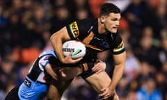 Nathan Cleary of Penrith Panthers is tackled during an NRLmatch against Cronulla Sharks in 2023