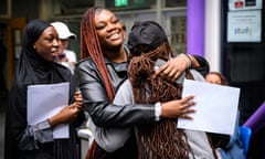 Students reacts after opening their GCSE results at the City of London Academy Southwark.