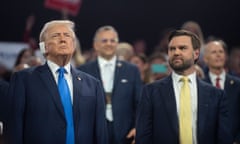 a man in a suit and tie looks at another man in a suit and tie with a bandage on his ear