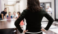 Teacher watching students in hallway<br>D4494X Teacher watching students in hallway