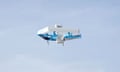 A white and blue Amazon drone delivering prescription drugs in College Station, Texas, US.