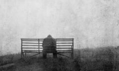 A mental health concept of mysterious figure back to camera, sitting on a bench alone. With a grunge, textured edit.