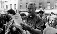 CND demonstration in Hyde Park, Monsignor Bruce Kent is pictured with flowers which the CND group were going to present to the Russian Embassy together with a formal letter against nuclear weapons, 16th July 1983. (Photo by Cairns/Daily Mirror/Mirrorpix/Getty Images)