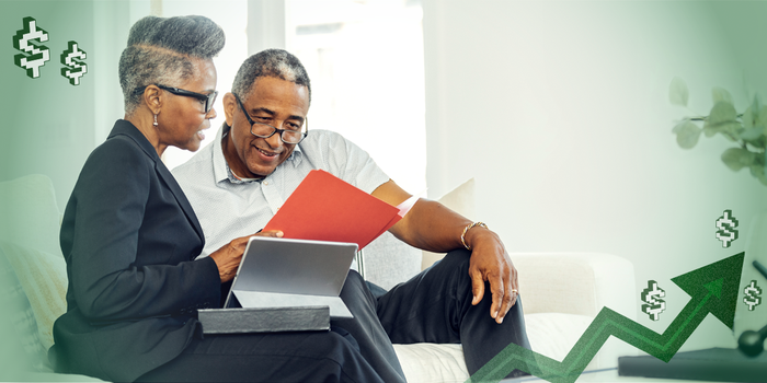 Photo of a man meeting with a financial advisor at home.