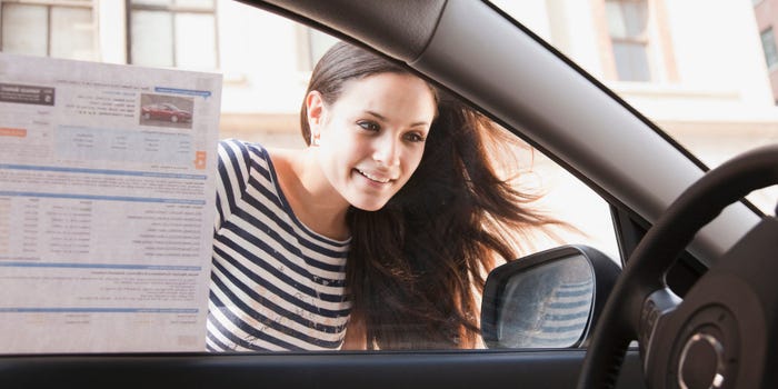 woman buying a car