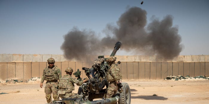 US Army Soldiers, assigned to 37th Infantry Brigade Combat Team, fire an M119 Howitzer during a live-fire exercise at Al Asad Air Base, Iraq, May 11, 2023.