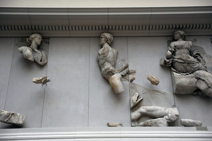 The Pergamon Altar in a museum in Berlin. From left to right: Theia with their opponents, giant fallen and Selene astride a mule.