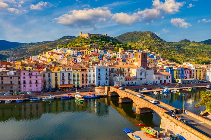 View of colorful buildings in Bosa in Sardinia, Italy. Aerial view of colorful houses in Bosa village, Sardegna.