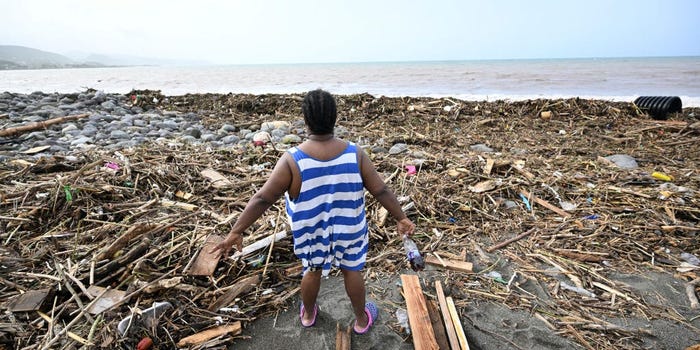 Jamaican looking at aftermath of hurricane Beryl