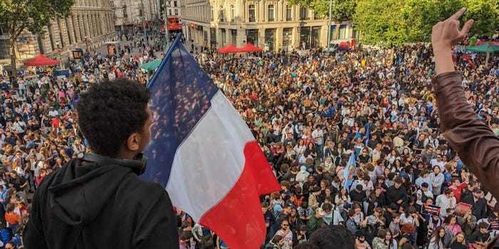 People in France gathered, cheering