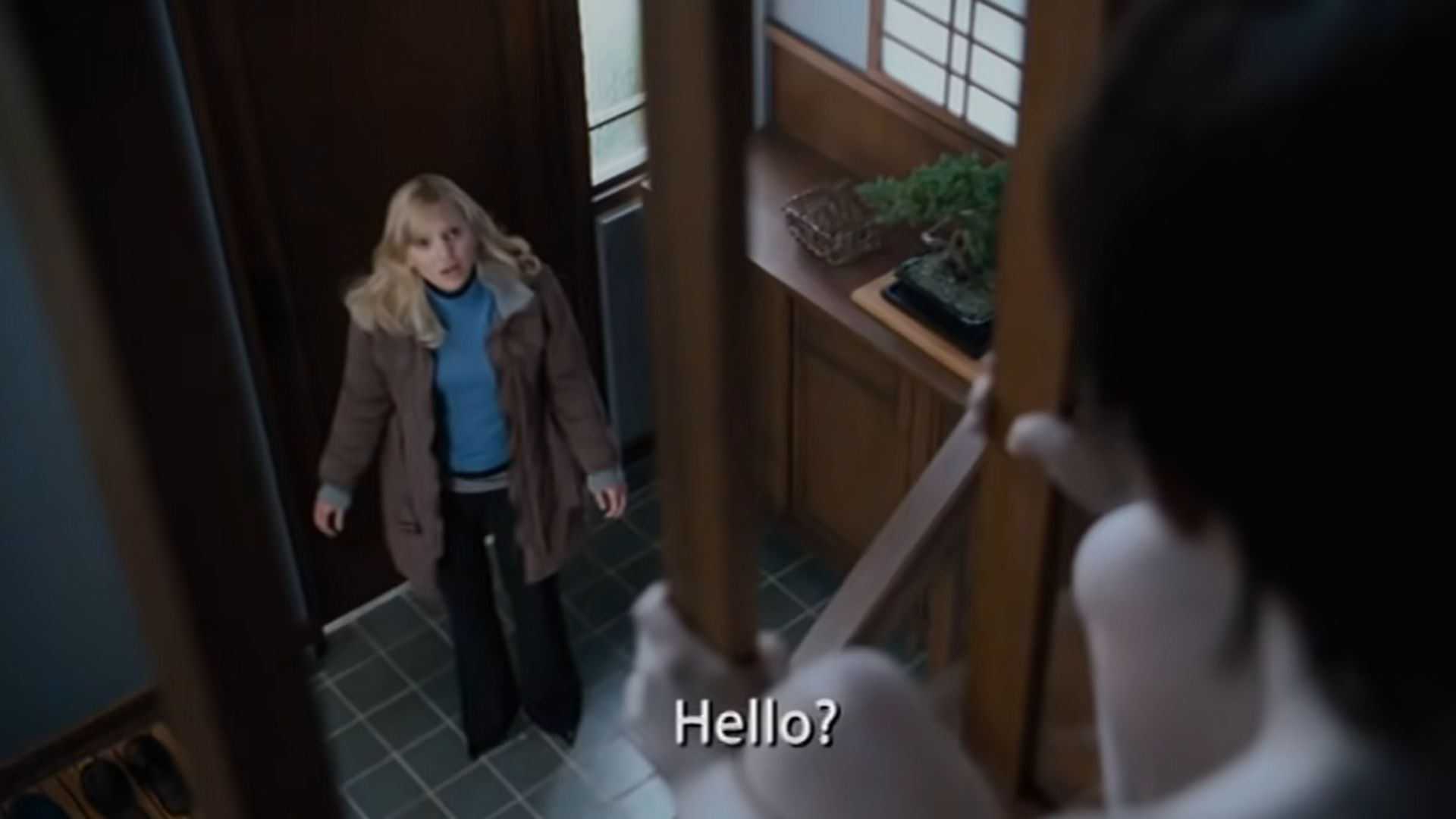 Screenshot from the Cindy Speaking Japanese Scene in the 2006 Scary Movie 4 comedy film. 