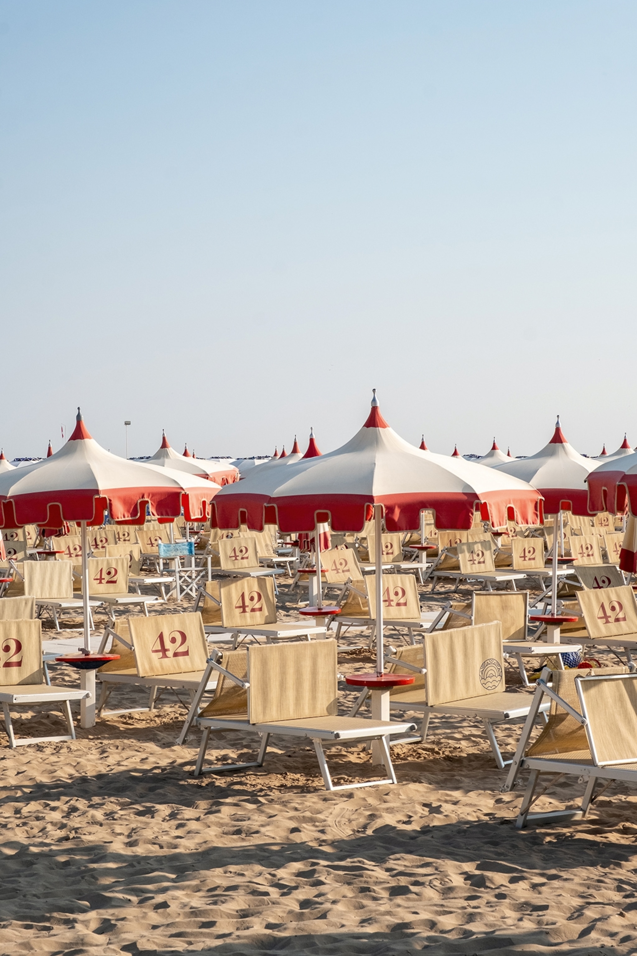 Red and white parasols