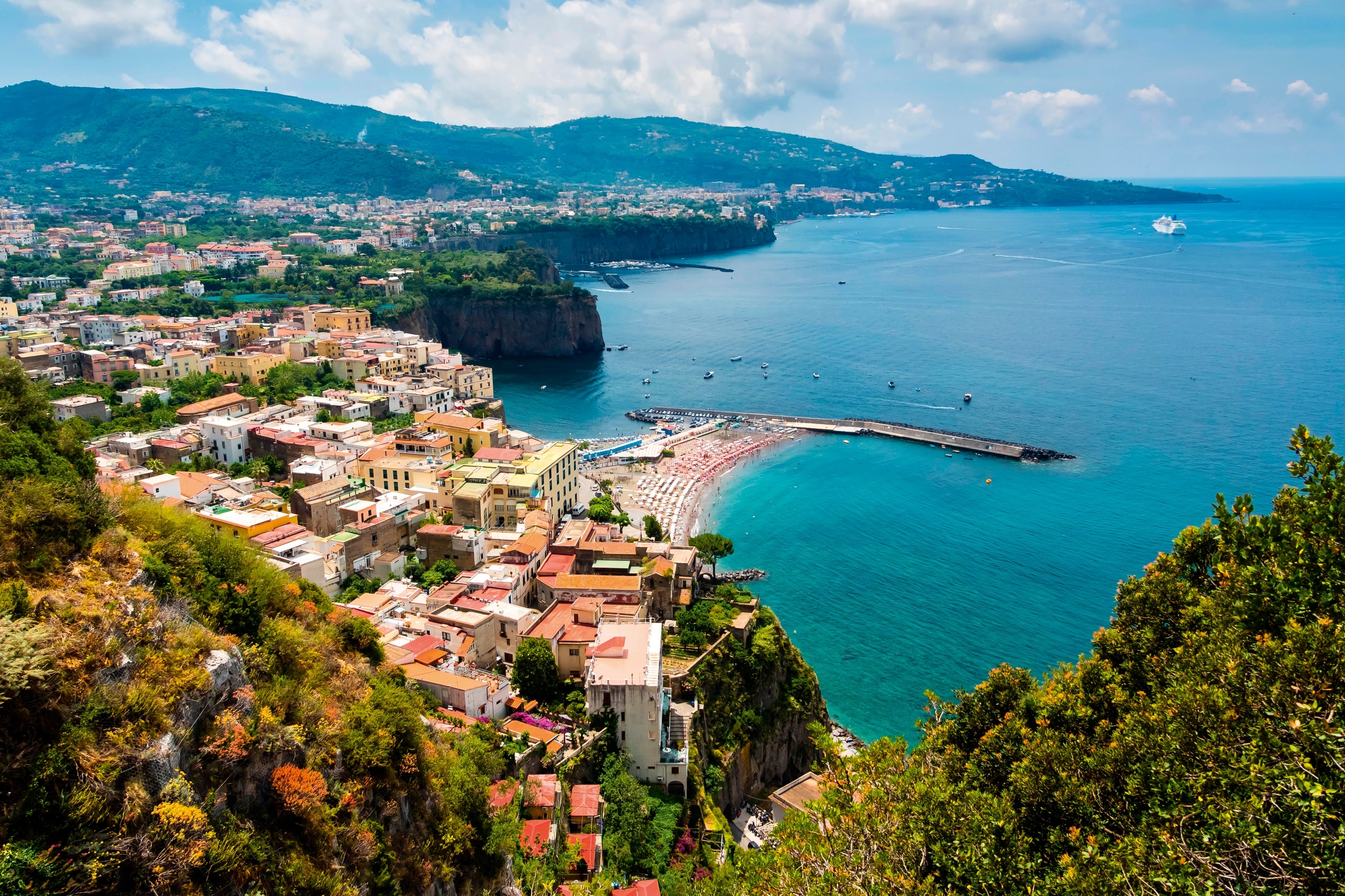 Clifftop view on a bay with houses and the ocean